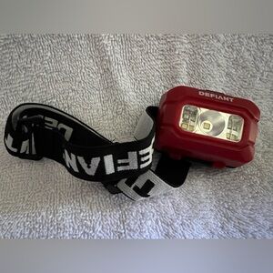 Defiant adjustable headlight / headlamp